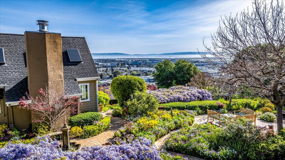 819 Holly Road Belmont, CA 94002 - Photo 8 of 75 a view of a back yard from a patio