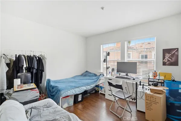 an aerial view of a house with a yard and trees