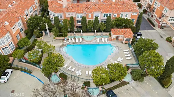 an aerial view of a house with yard