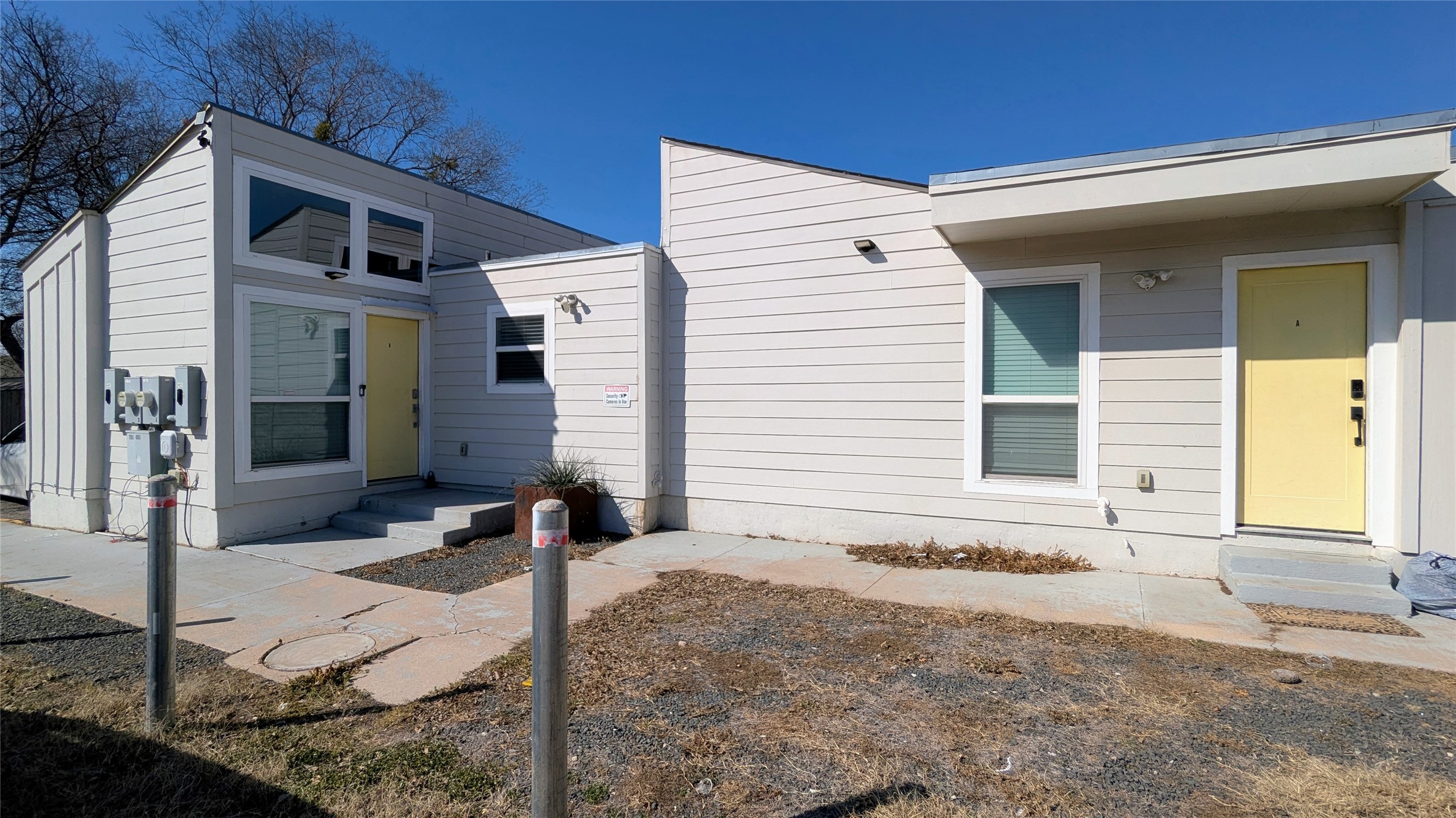 a front view of a house with parking