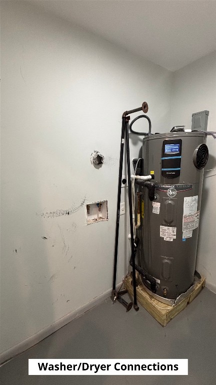 4505 Teri Road, Unit B Austin, TX 78744 - Photo 17 of 22 a room with water heater and wooden cabinets