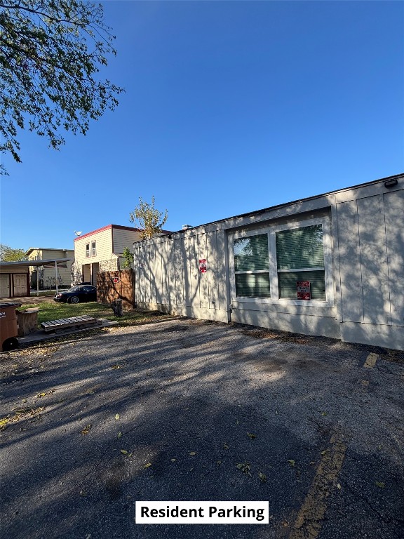 4505 Teri Road, Unit B Austin, TX 78744 - Photo 21 of 22 a view of a house with a yard