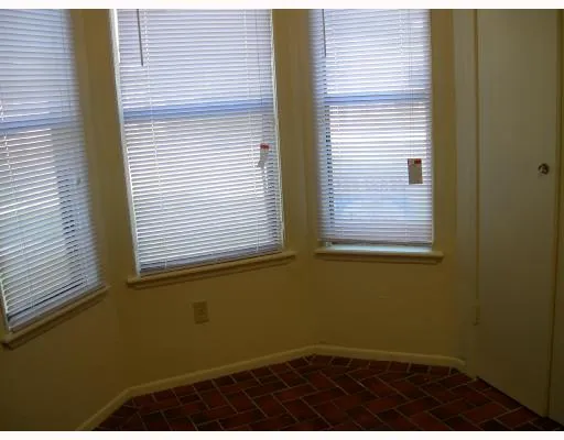 a view of a door and a window