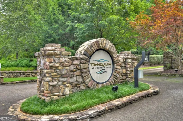 a sign board with a outdoor space