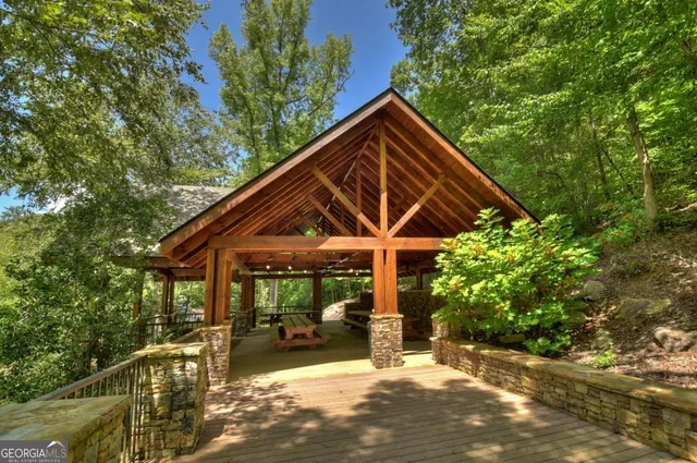 a view of a park with swings and slides