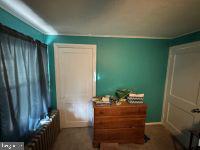 1319 Washington Street Huntingdon, PA 16652 - Photo 14 of 20 Cozy room with vibrant teal walls.