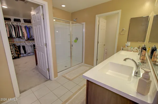 a bathroom with a sink and mirror