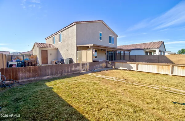 a view of a house with a swimming pool