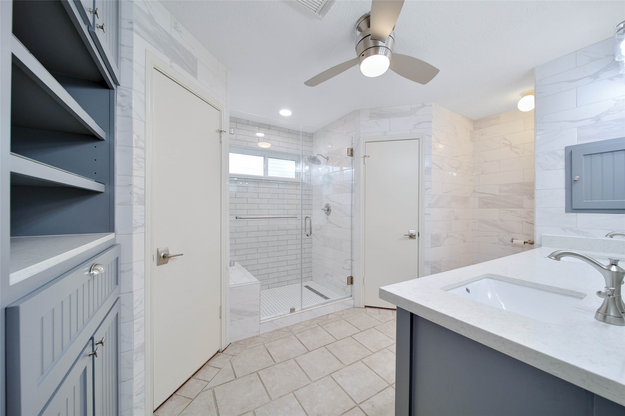 5010 Cupids Bower Court Spring, TX 77388 - Photo 16 of 40 a bathroom with a sink a toilet and shower