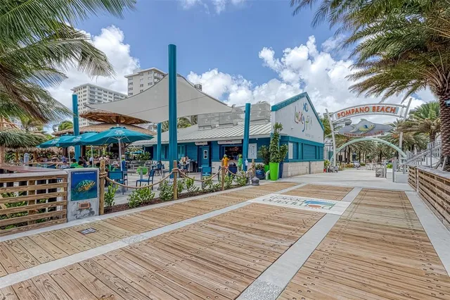a view of street with sitting area
