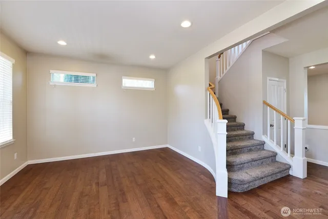 a view of entryway with wooden floor