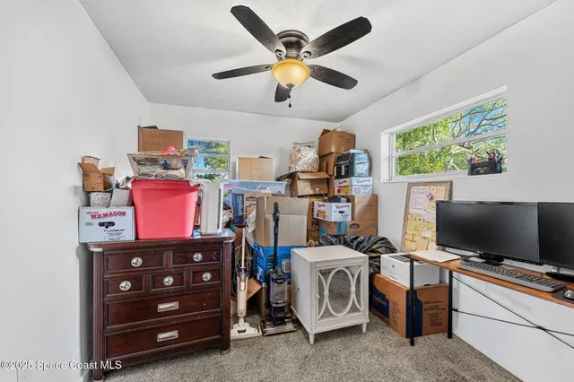 a room with furniture and a flat screen tv