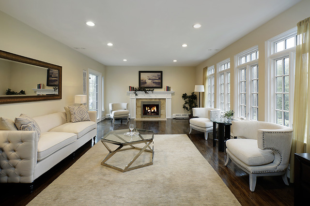 1198 Chatfield Road Winnetka, IL 60093 - Photo 3 of 25 a living room with furniture and a fireplace