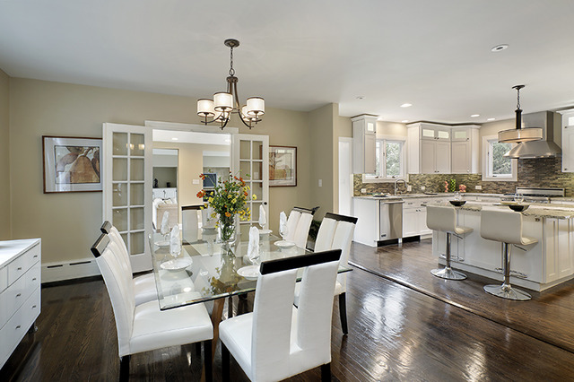 1198 Chatfield Road Winnetka, IL 60093 - Photo 8 of 25 a view of a dining room with furniture a chandelier and wooden floor