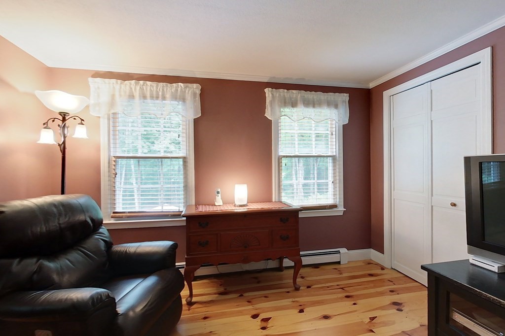 95 Clement Road Townsend, MA 01474 - Photo 16 of 42 a livingroom with workspace and a window