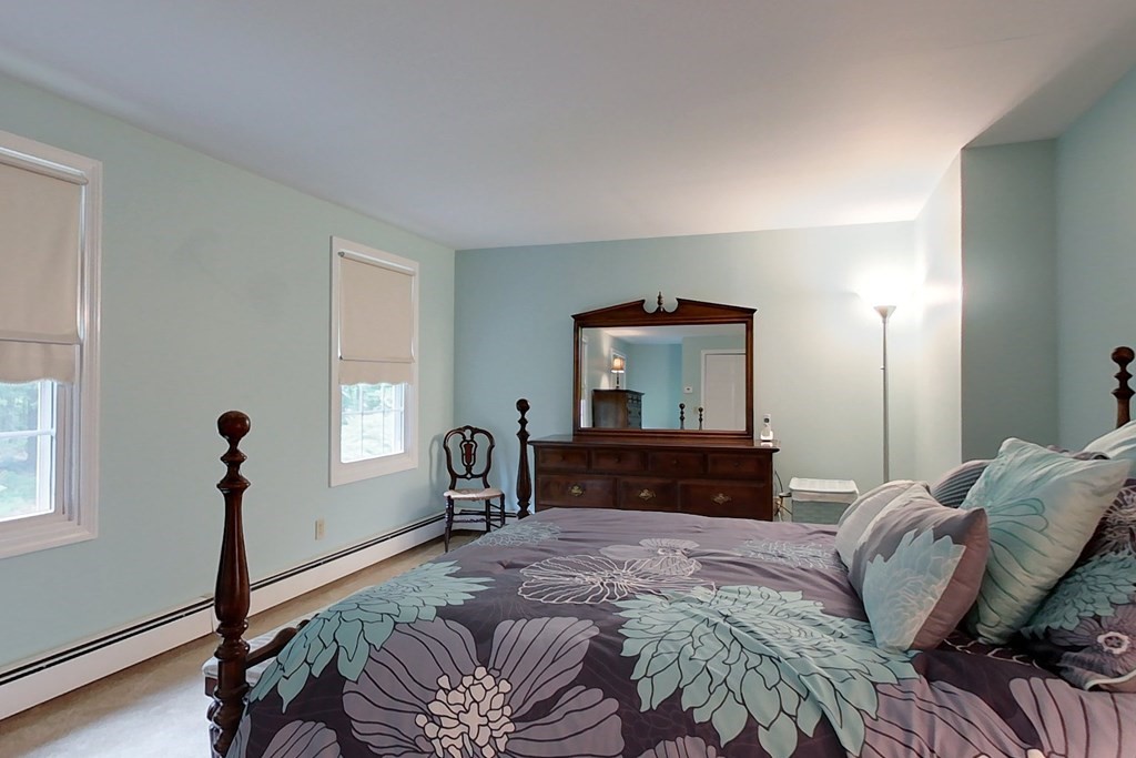 95 Clement Road Townsend, MA 01474 - Photo 24 of 42 a bedroom with a bed and a window