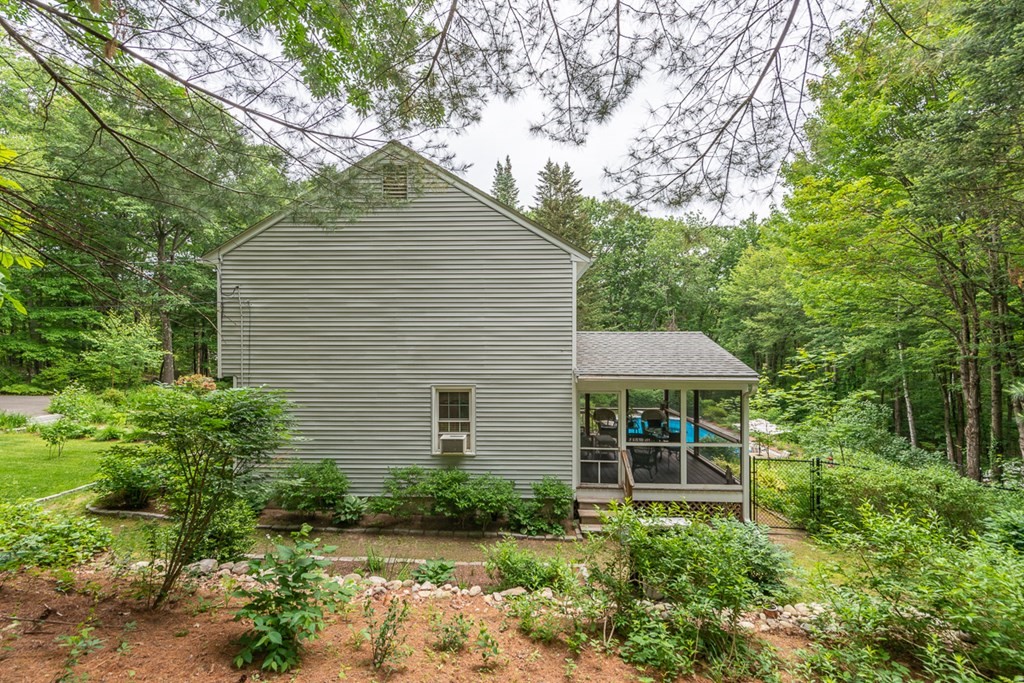 95 Clement Road Townsend, MA 01474 - Photo 35 of 42 a front view of a house with a yard