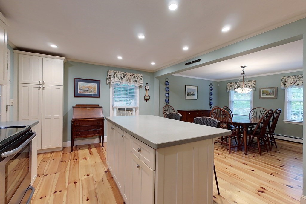 95 Clement Road Townsend, MA 01474 - Photo 5 of 42 a room with furniture a dining table and chairs with wooden floor
