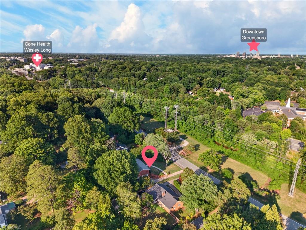 113 Green Valley Road Greensboro, NC 27403 - Photo 21 of 46 There's a reason Starmount Forest continues to be one of Greensboro's most sought-after neighborhoods—mature trees, established homes, and a location that's close to everything.