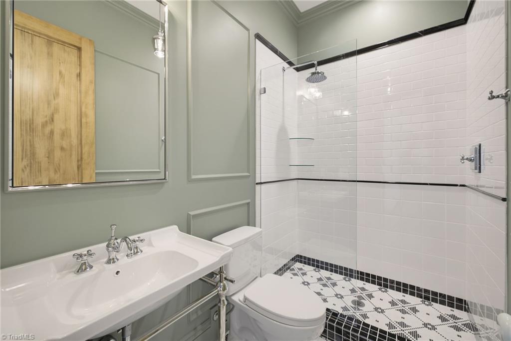 568 North Bunker Hill Road Oak Ridge, NC 27310 - Photo 27 of 49 Primary bathroom with separate shower and tub.