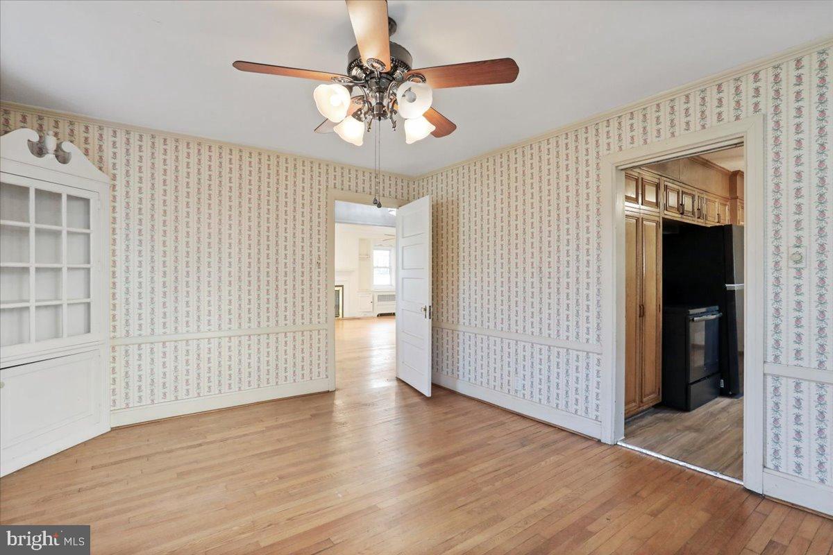19011 Orchard Terrace Road Hagerstown, MD 21742 - Photo 11 of 41 wooden floor in an empty room with a window