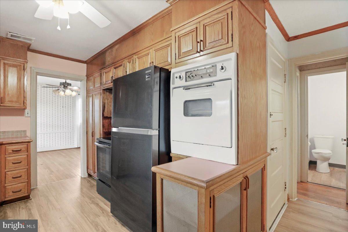 19011 Orchard Terrace Road Hagerstown, MD 21742 - Photo 13 of 41 a kitchen with stainless steel appliances a refrigerator and a refrigerator