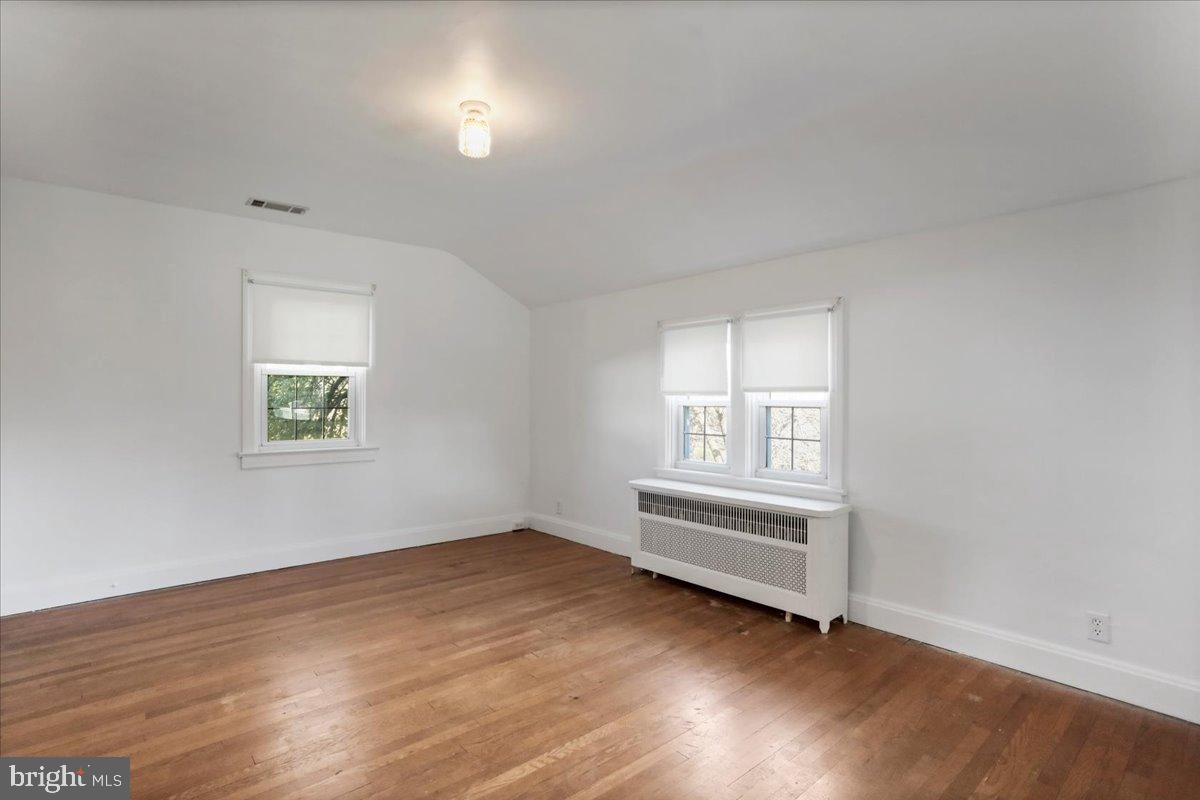 19011 Orchard Terrace Road Hagerstown, MD 21742 - Photo 29 of 41 an empty room with wooden floor and windows