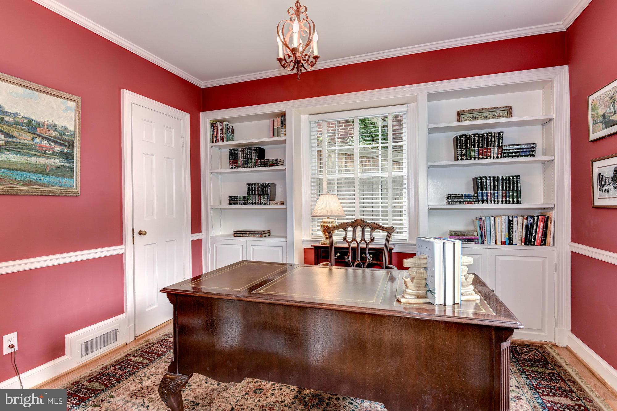 5228 Elliott Road Bethesda, MD 20816 - Photo 10 of 30 Library (with door to powder room)