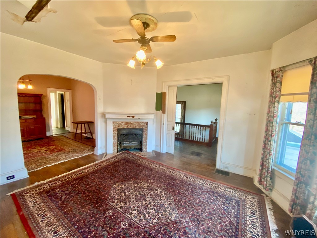 402 Baynes Street Buffalo, NY 14213 - Photo 18 of 37 Upper Apartment: Wood floors and a decorative fir
