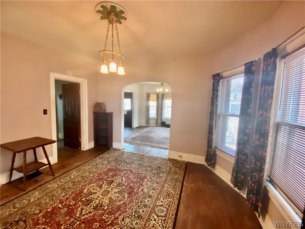 402 Baynes Street Buffalo, NY 14213 - Photo 21 of 37 Upper Apartment: Arched doorway between the livi