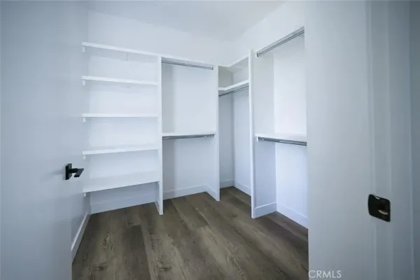 a kitchen with stainless steel appliances granite countertop a refrigerator stove and microwave