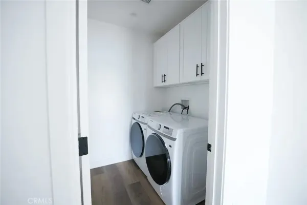 a kitchen with stainless steel appliances a refrigerator sink and stove