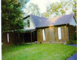 a house view with a garden space