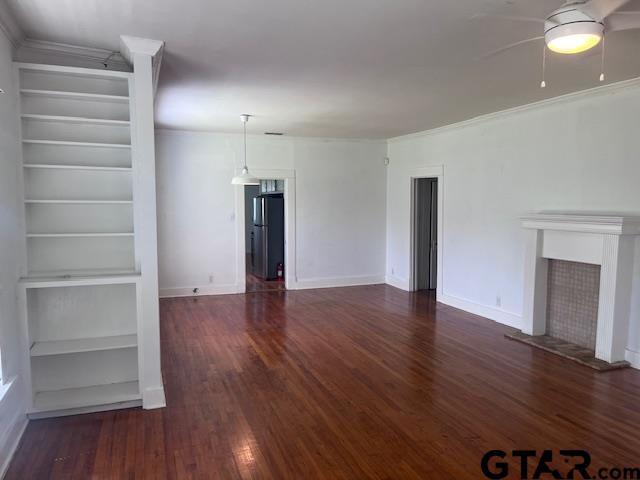 617 West Dobbs Street Tyler, TX 75701 - Photo 14 of 19 a view of empty room with wooden floor and window