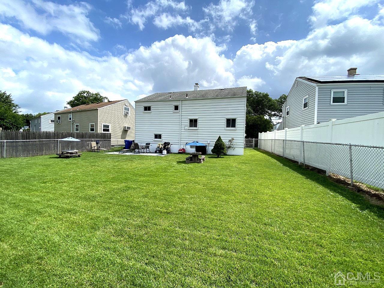 169 McFarlane Road Colonia, NJ 07067 - Photo 3 of 11 a view of an house with backyard space and porch
