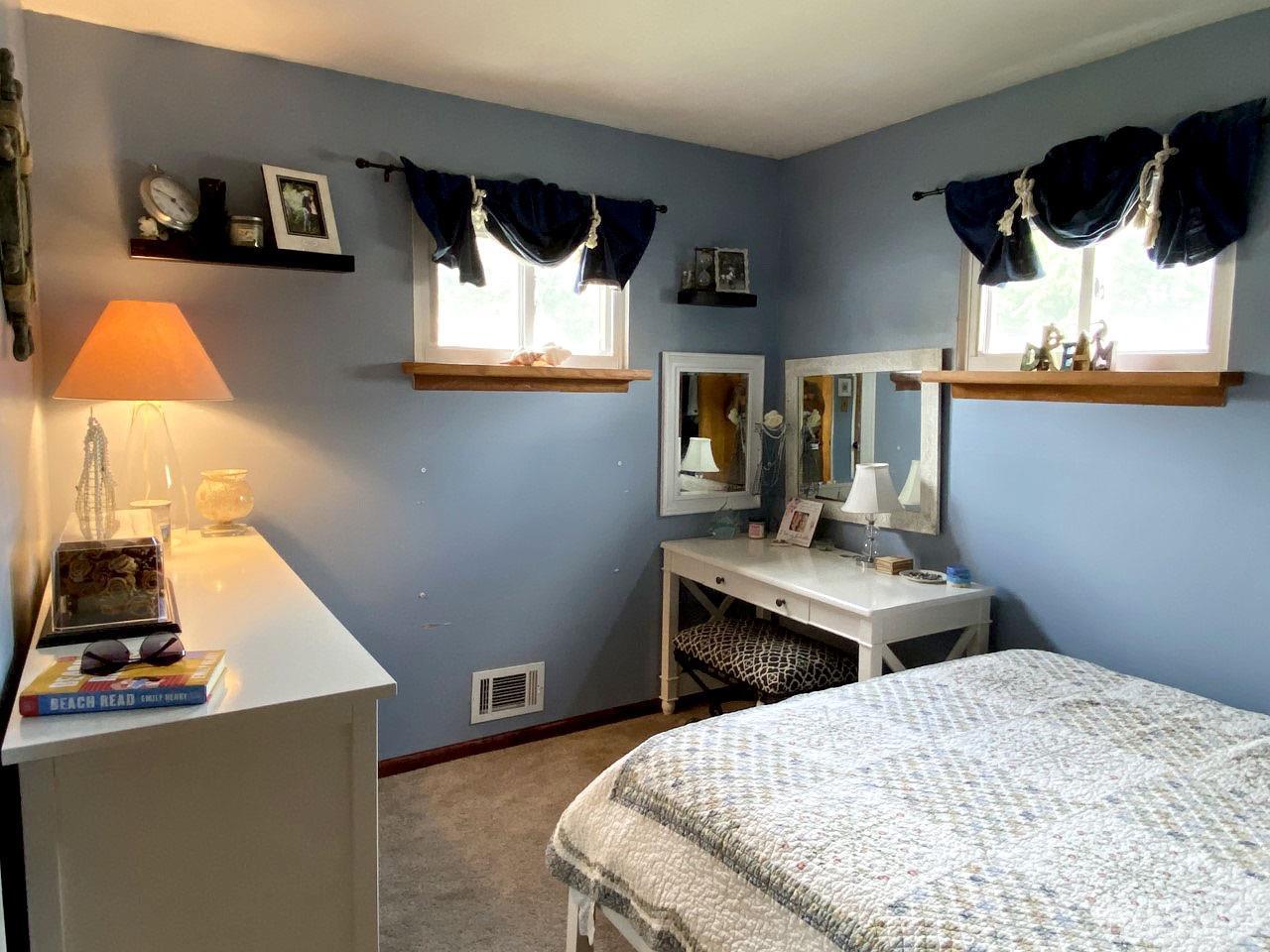 169 McFarlane Road Colonia, NJ 07067 - Photo 9 of 11 a room with a bed and a table in it