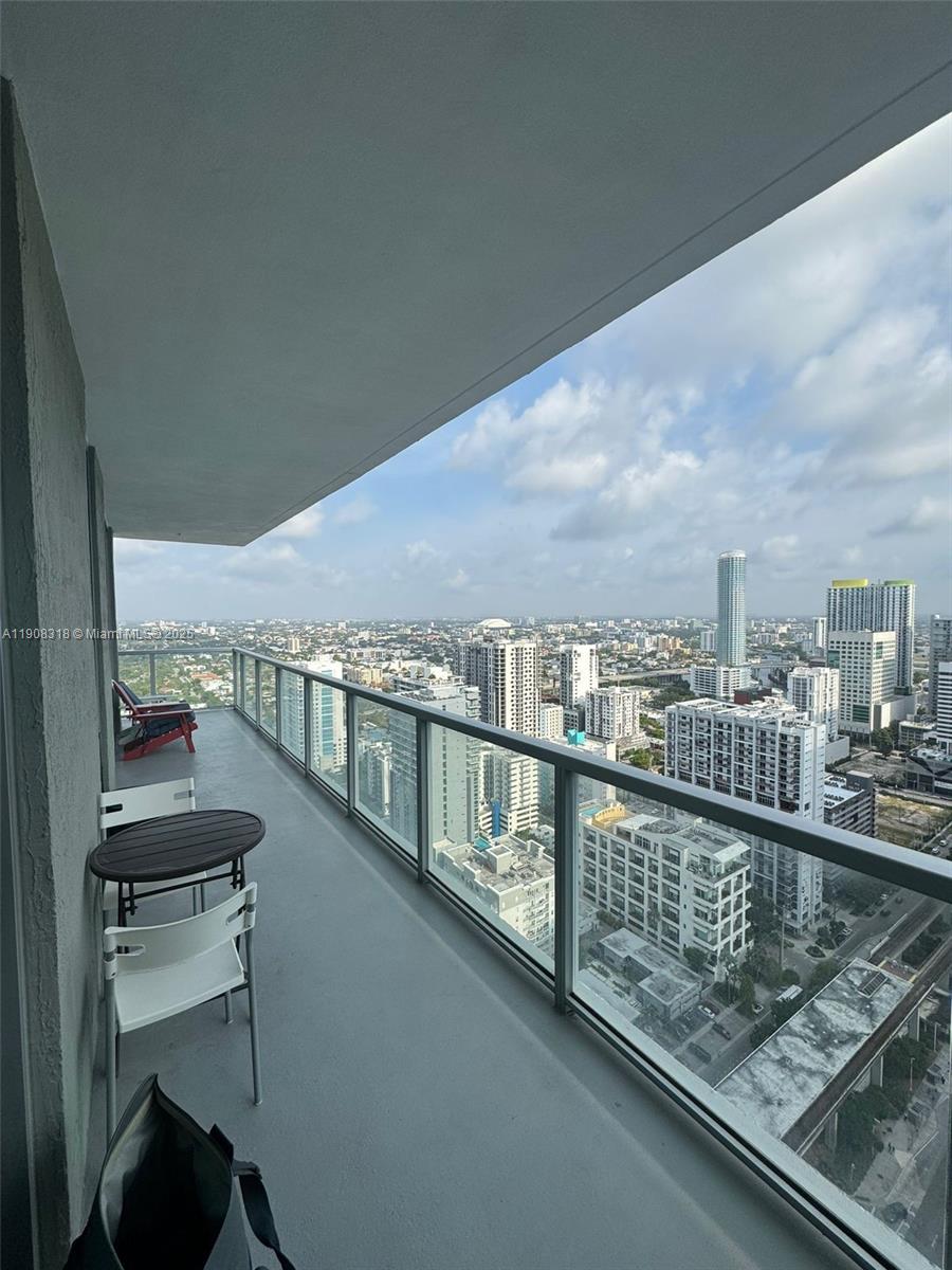 79 Southwest 12th Street, Unit 4012S Miami, FL 33130 - Photo 20 of 34 a view of a balcony with city view