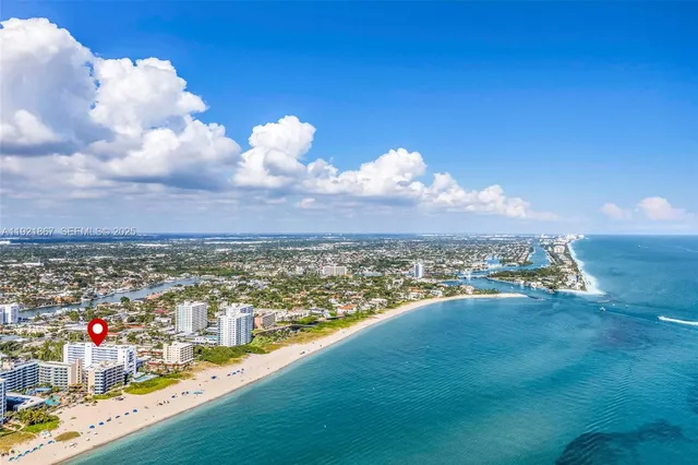 a view of a bunch of green and trees in the background