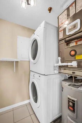a view of a house with a palm tree