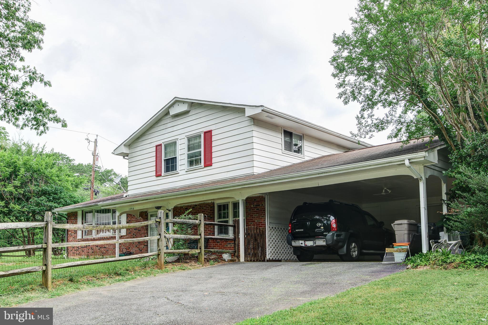 12916 Clarion Road Fort Washington, MD 20744 - Photo 2 of 35 Driveway leading to carport.