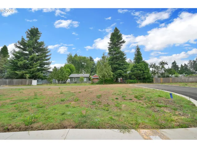a view of a lake with a large building