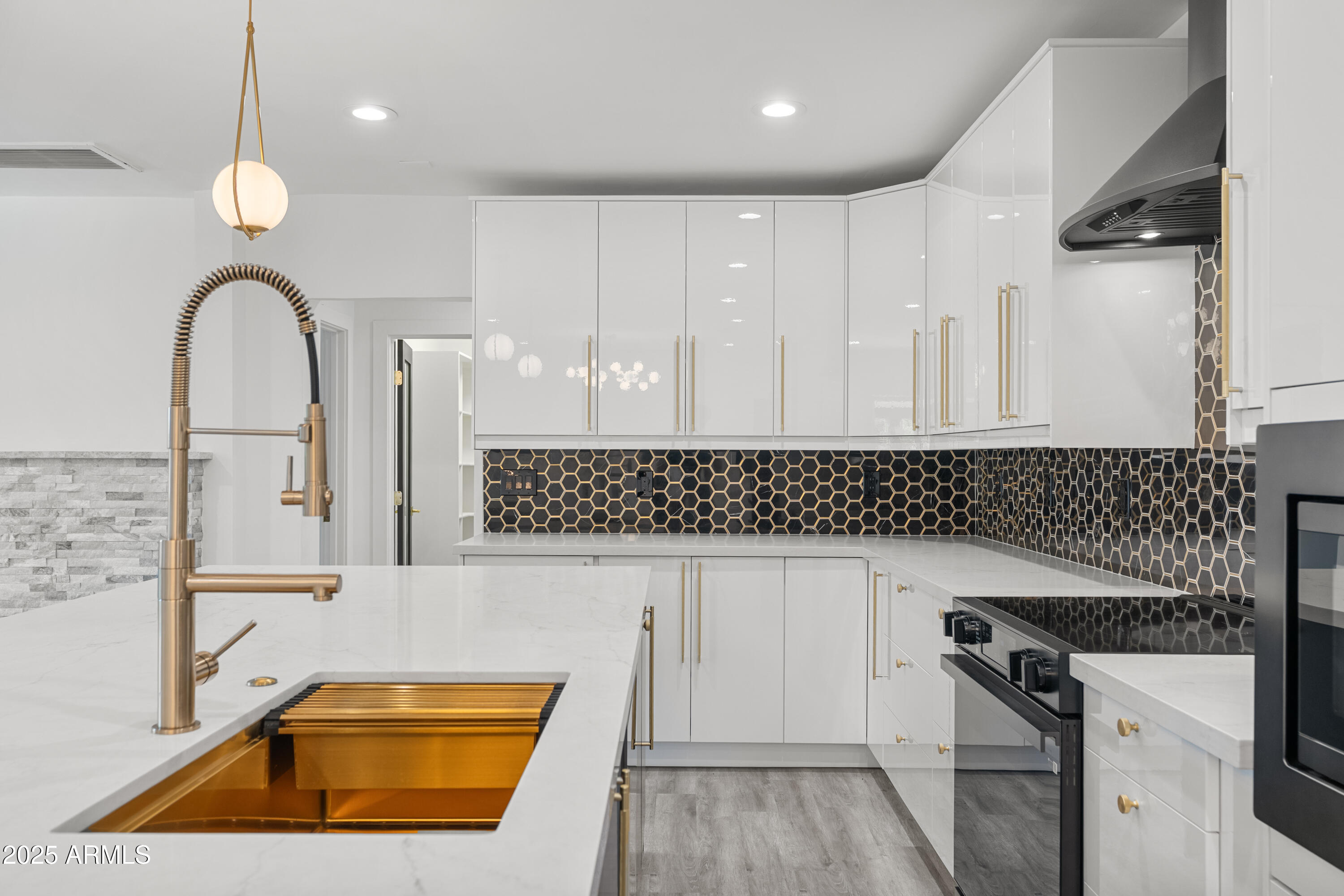2502 East Whitton Avenue Phoenix, AZ 85016 - Photo 10 of 34 a kitchen with a sink a stove and cabinets