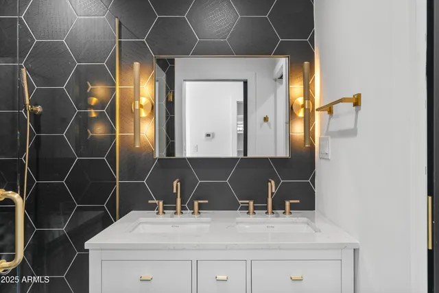 a view of a hallway with wooden floor and closet