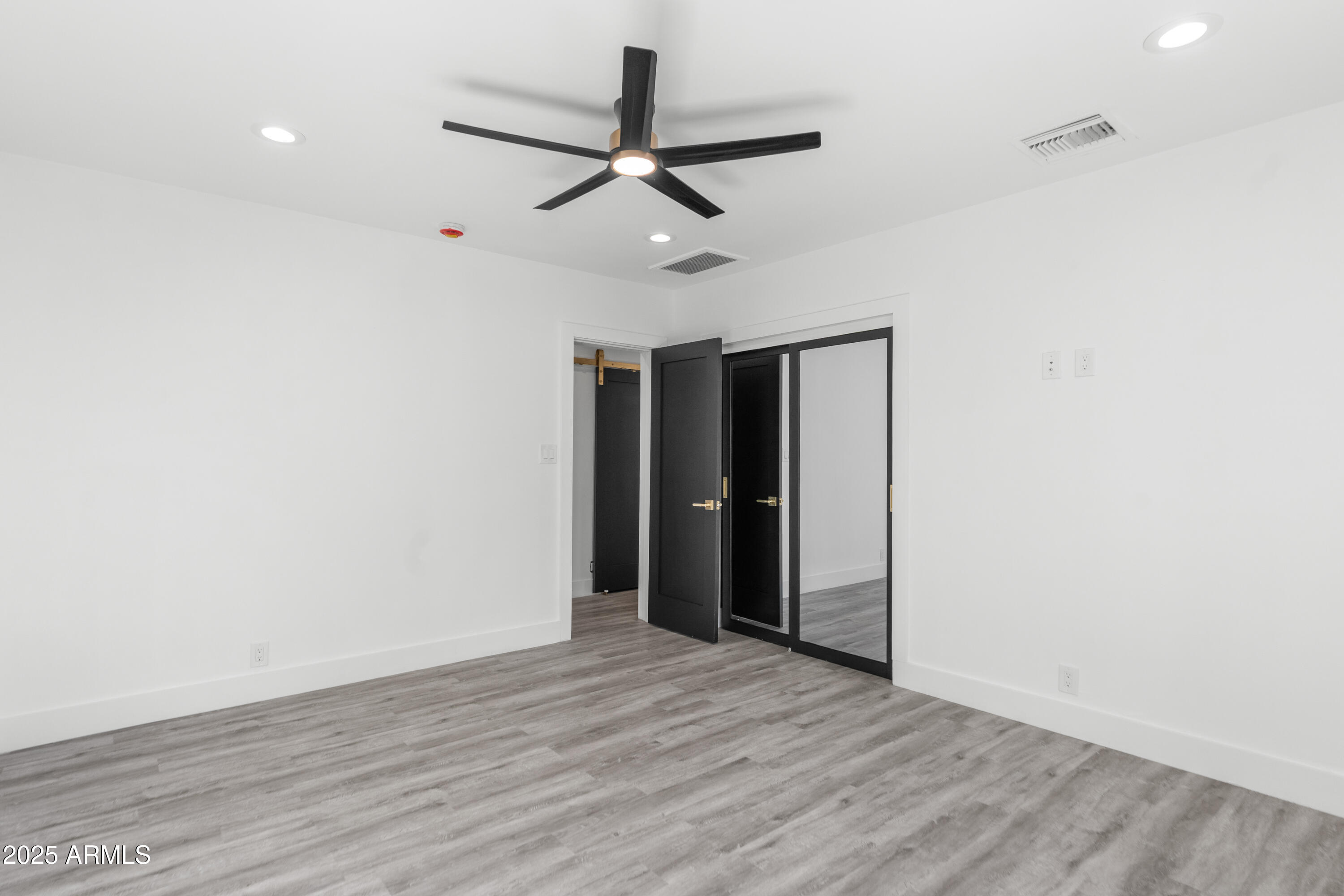 2502 East Whitton Avenue Phoenix, AZ 85016 - Photo 28 of 34 wooden floor in an empty room