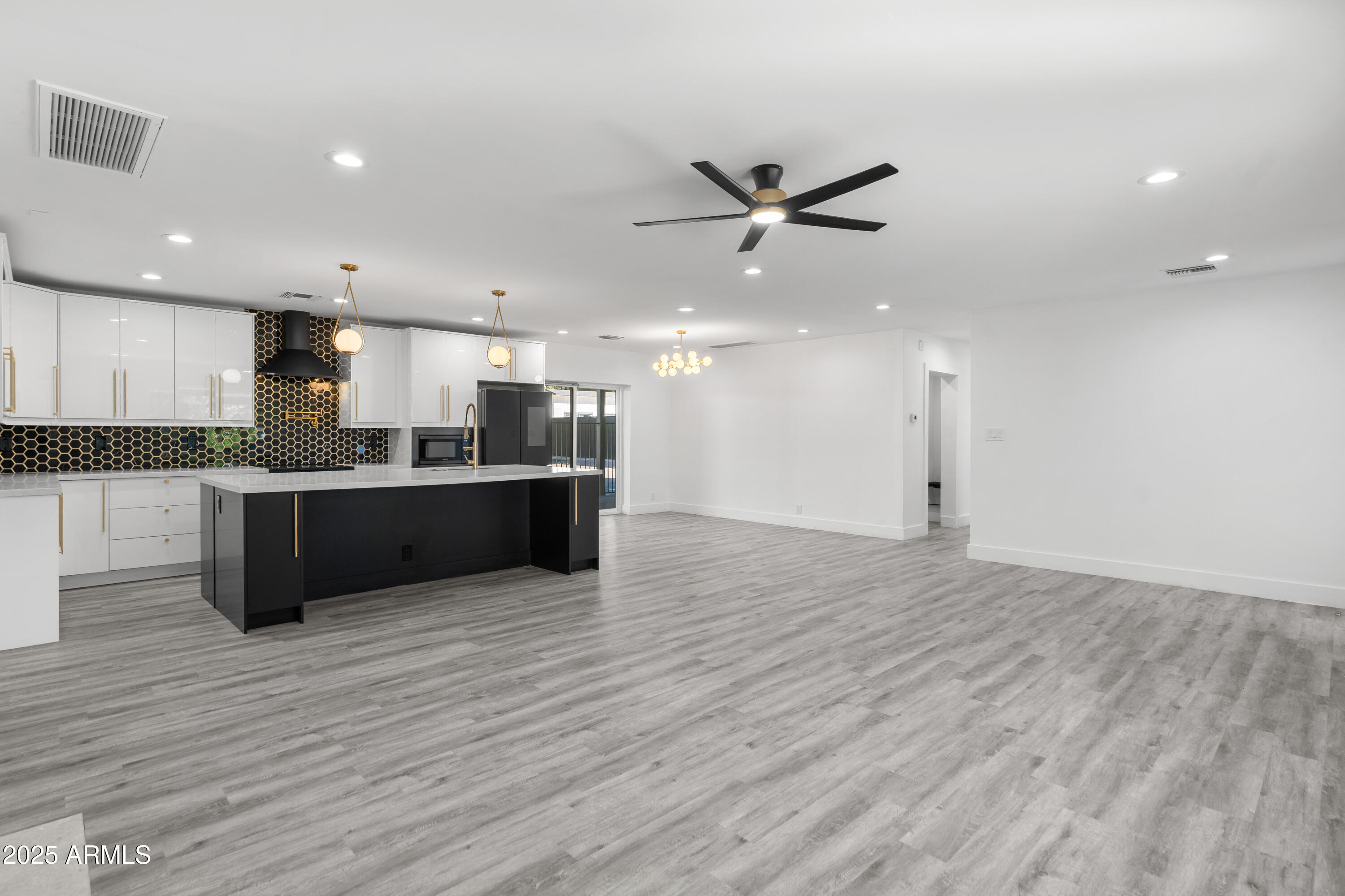 2502 East Whitton Avenue Phoenix, AZ 85016 - Photo 6 of 34 a view of kitchen with wooden floor and window