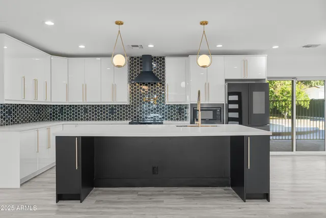 a view of kitchen with wooden floor and window