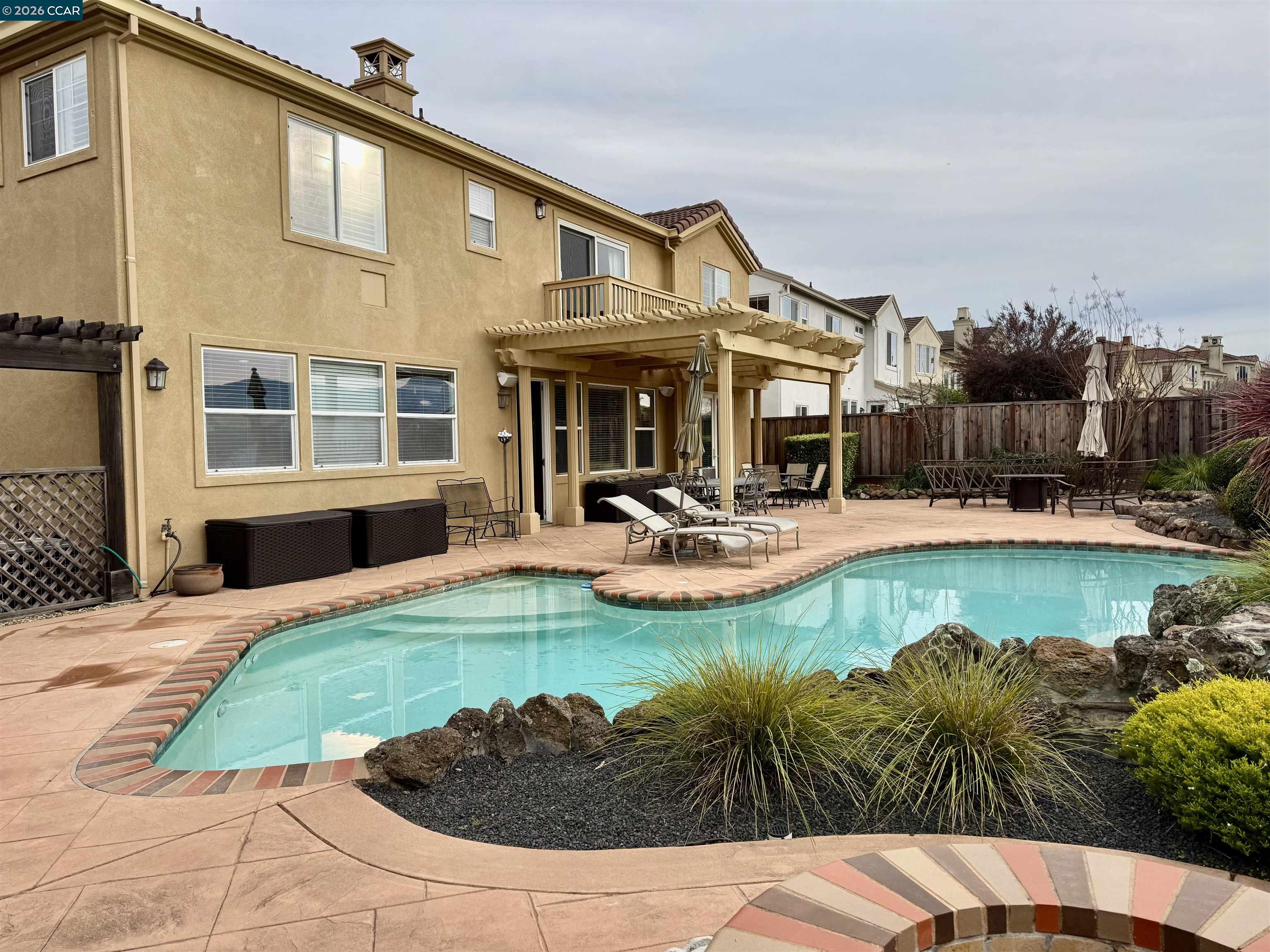 9348 Mediar Drive San Ramon, CA 94582 - Photo 2 of 7 a view of a house with swimming pool and furniture