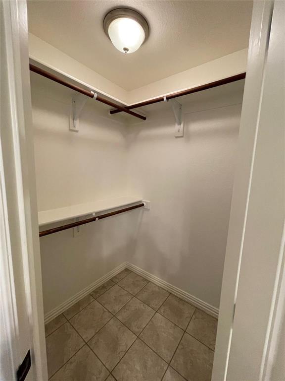628 East Walcott Street Pilot Point, TX 76258 - Photo 11 of 27 Primary closet 1