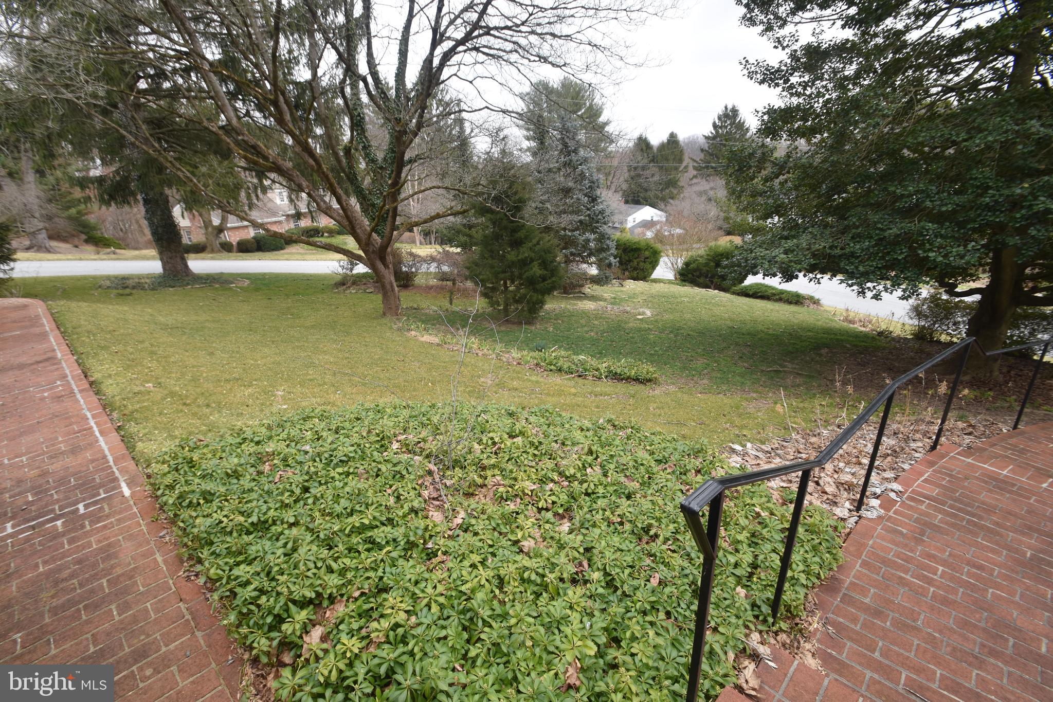 2 Kings Ridge Road Wilmington, DE 19808 - Photo 15 of 78 Both Brick Sidewalks converge to front door.
