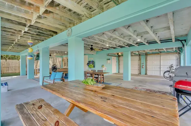 a backyard of a house with seating space